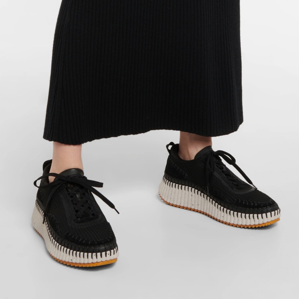 Chloe Nama in black
